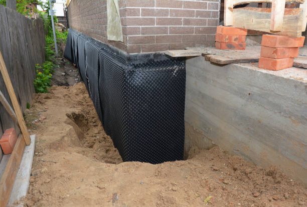 Happy homeowners after waterproofing job in Catharpin